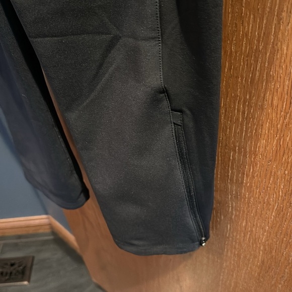 Men’s Salomon Wind Shield pants, size medium, zippered bottom cuffs. - Picture 4 of 9